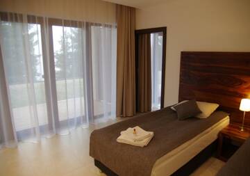 Фото номера Семейный номер с видом на озеро Отель M Club Hotel | Lubie Resort г. Дравско-Поморске 7