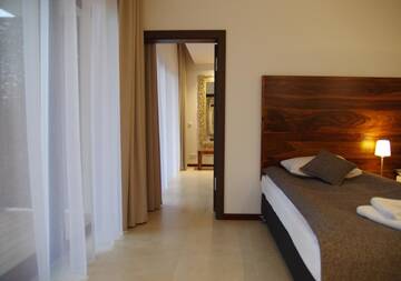 Фото номера Семейный номер с видом на озеро Отель M Club Hotel | Lubie Resort г. Дравско-Поморске 8